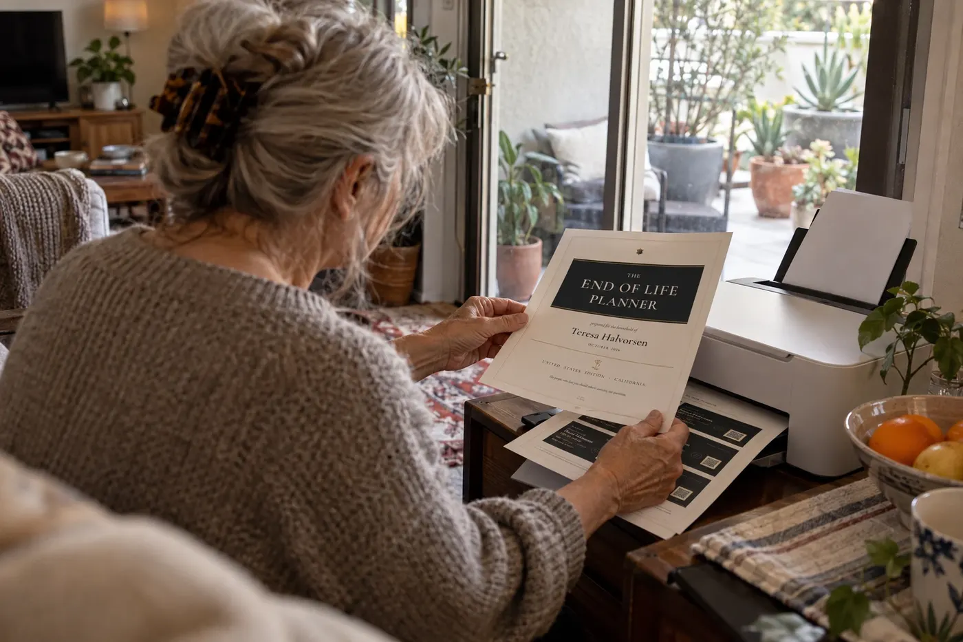 A woman taking the planner's pages from a home printer